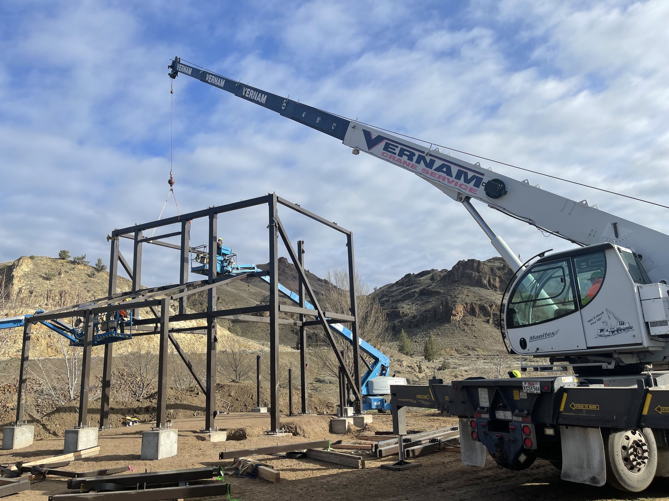 Washington Family Ranch steel frame being erected by crane